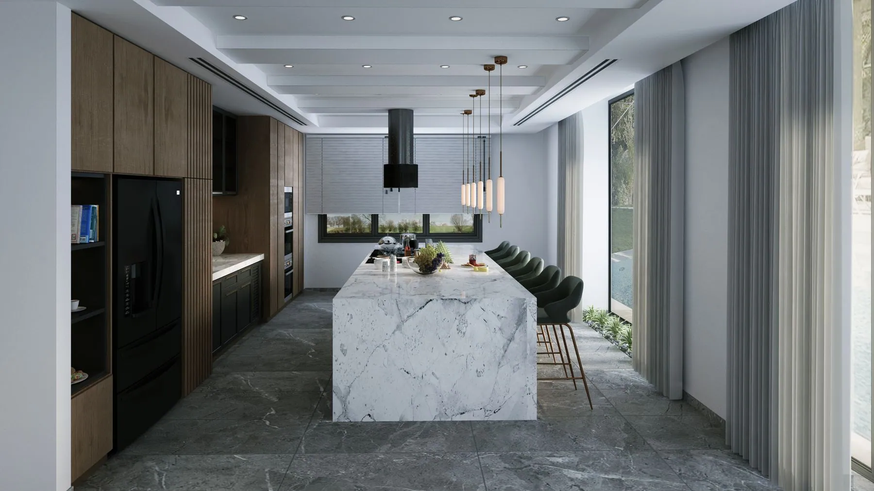 A long kitchen with a marble waterfall island running the length of the room