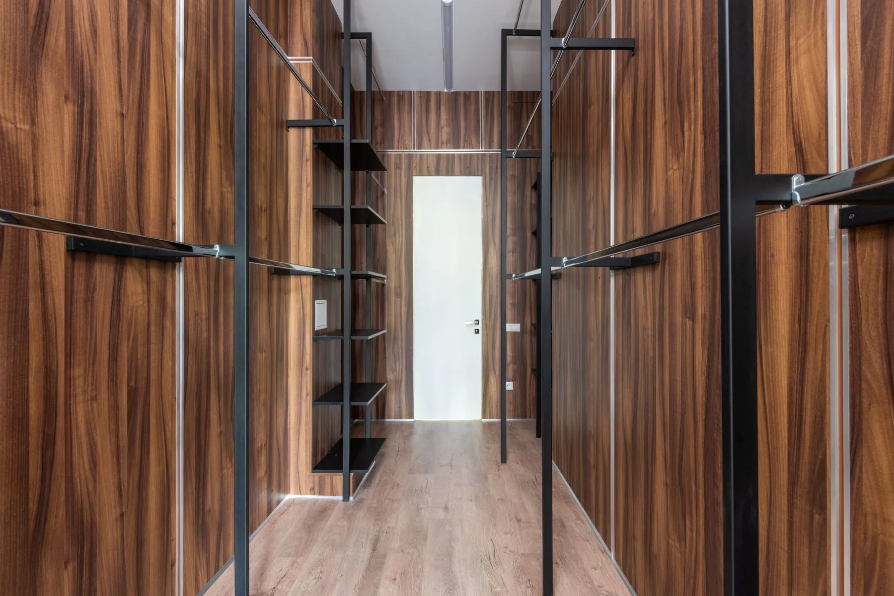 Wardrobe run finishing into a corner with a scribe stile cut to an out-of-square wall