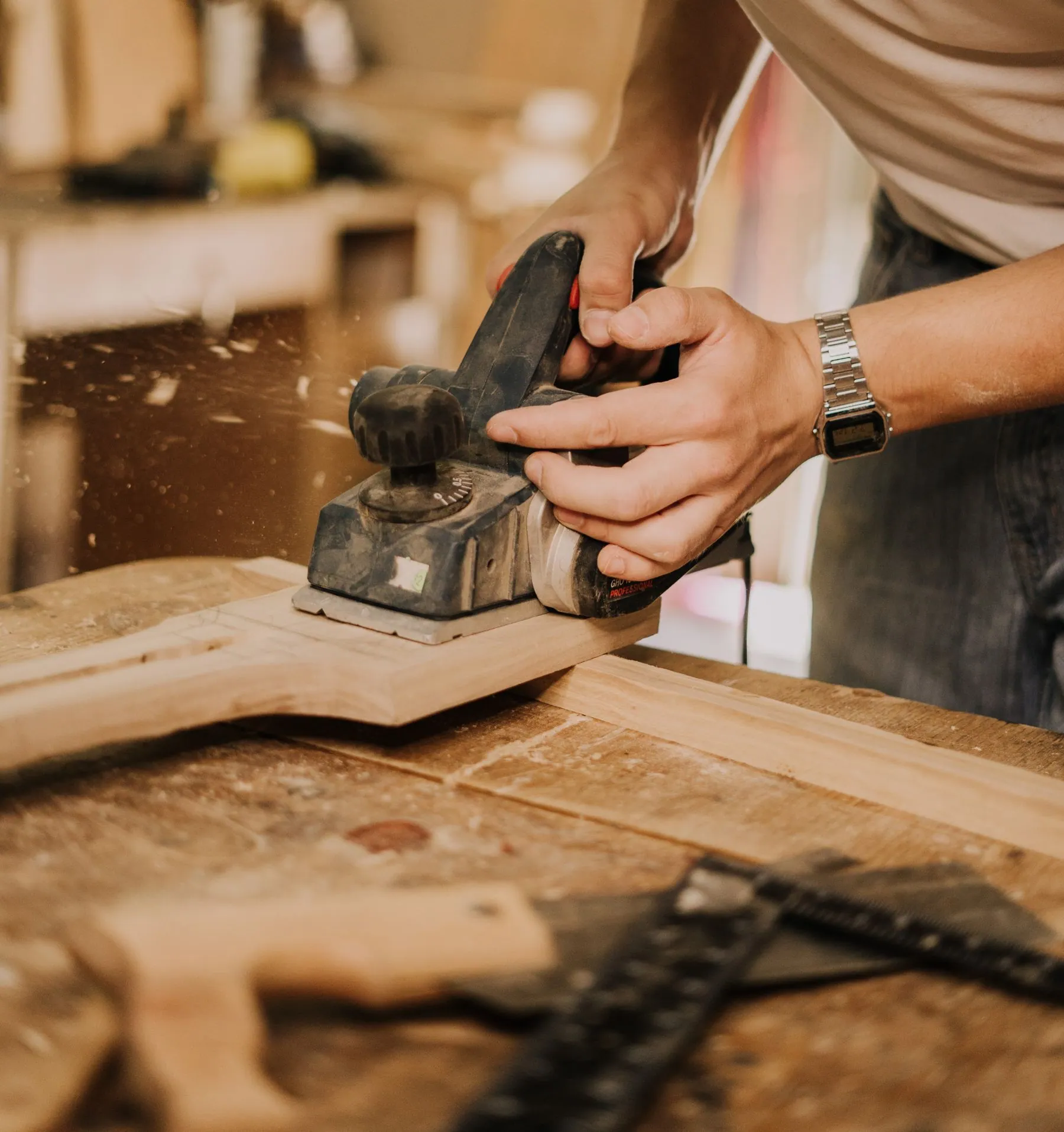 Cabinetmaker checking a frameless carcass for square before edgebanding and spray finishing