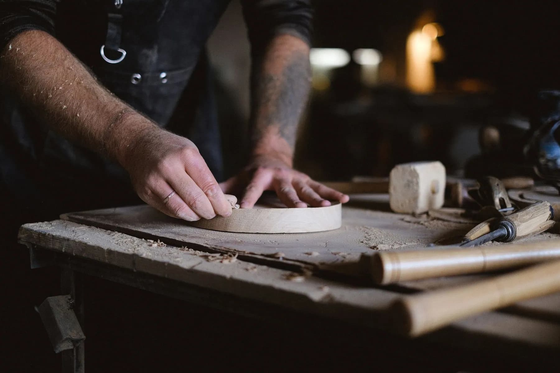 Curved component being shaped by hand in the finishing shop