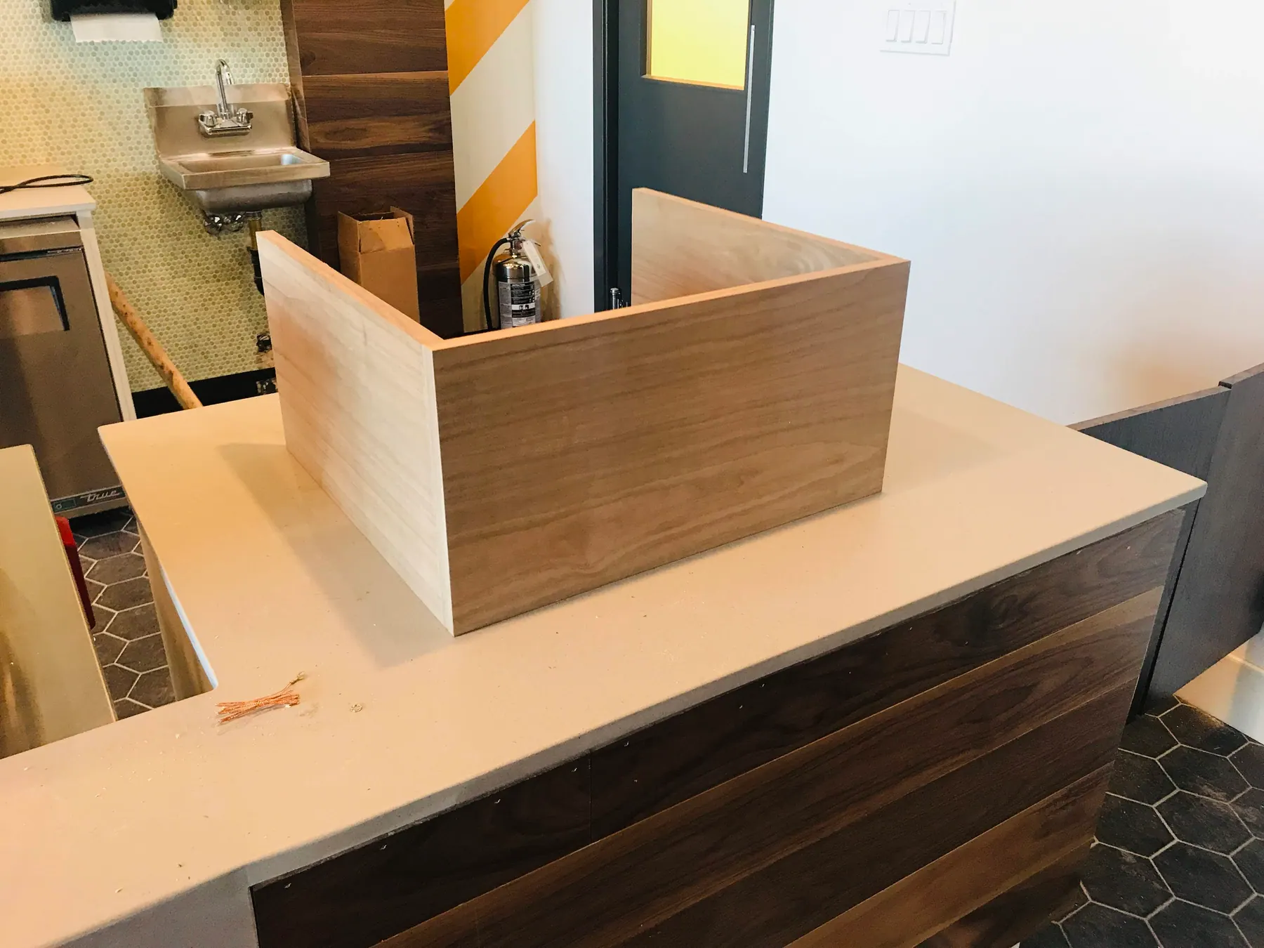Counter built around the ice machine and undercounter refrigeration