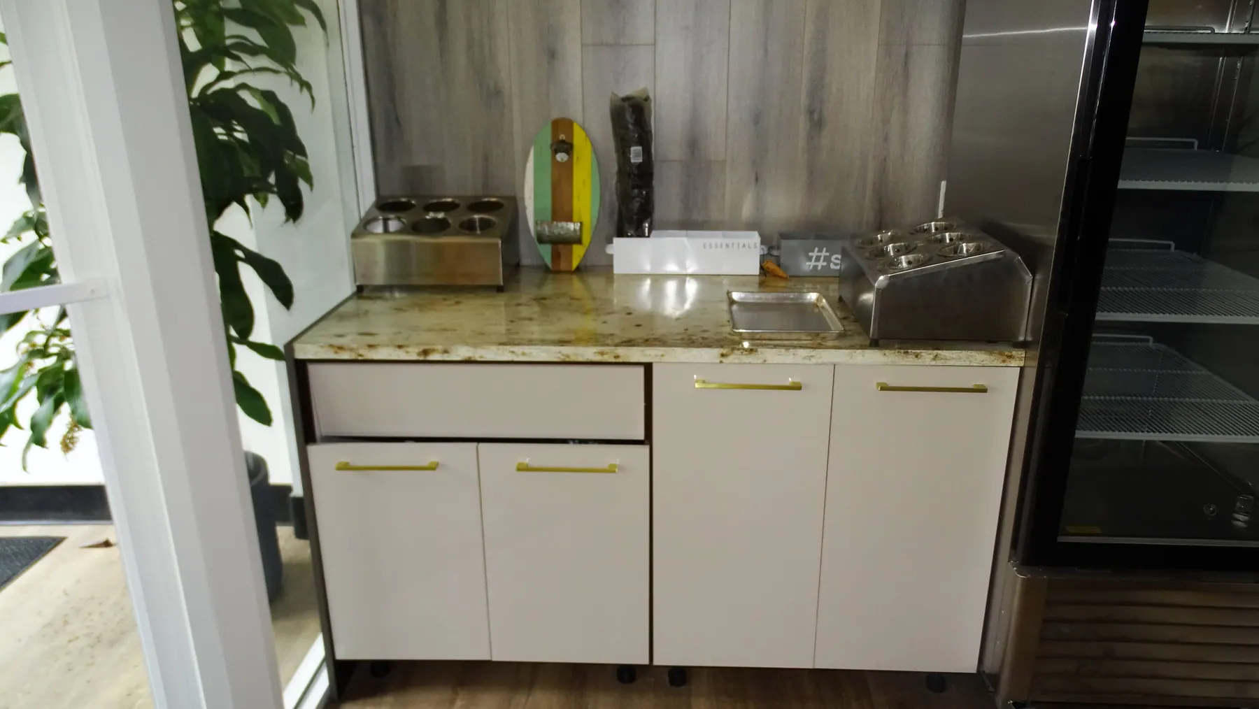 Service run built tight against stainless equipment