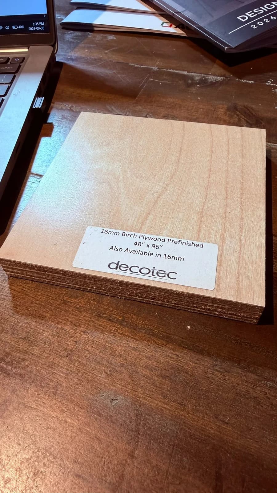 A stack of prefinished birch plywood, labelled 18mm and also available in 16mm